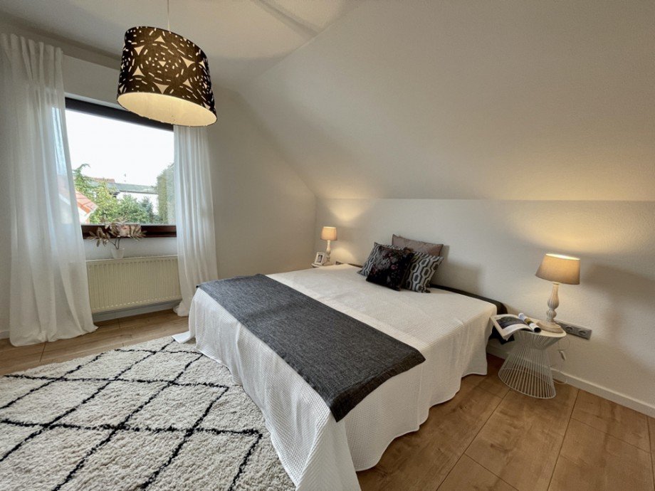 Schlafzimmer DG Einfamilienhaus Gro�-Rohrheim