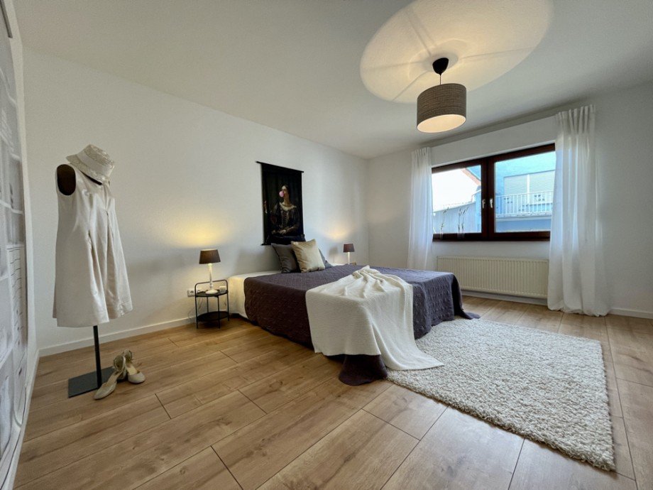 Schlafzimmer I Einfamilienhaus Gro�-Rohrheim