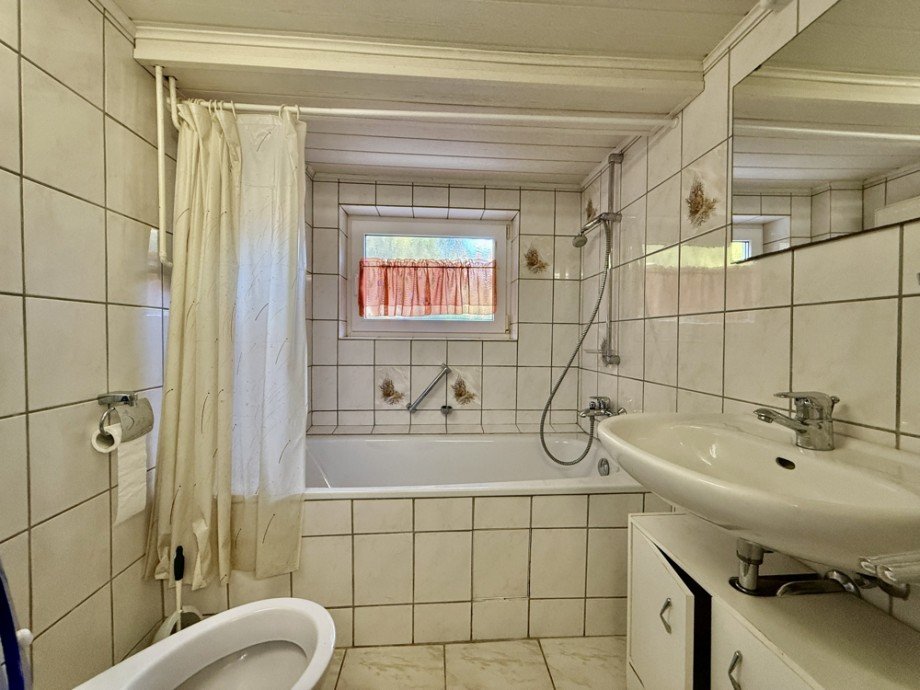 G�stebad UG Zweifamilienhaus Laudenbach